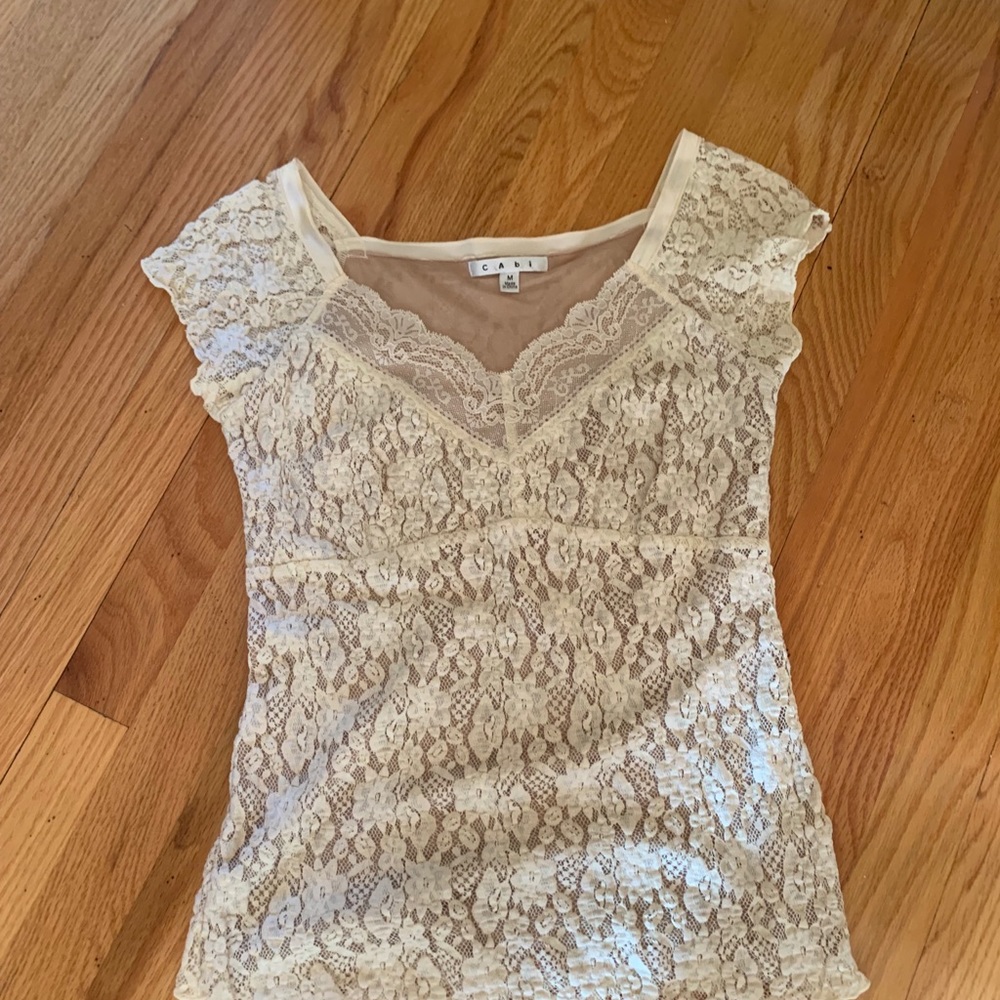 Lace shirt sleeve top.